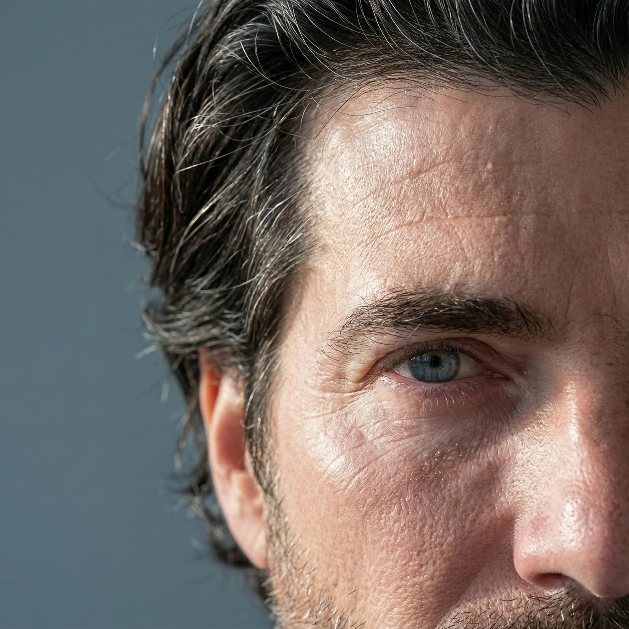 Close-up of René Fris with a clear blue sky background